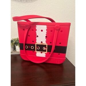 Bogg Bag features a festive Santa Claus belt design on a red EVA foam tote